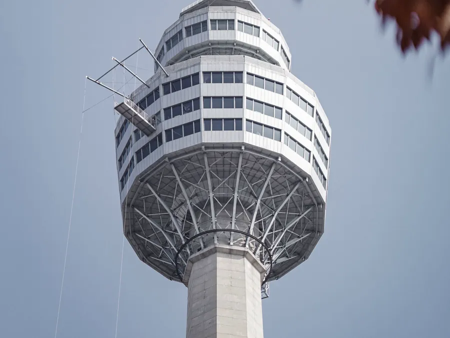 The observation deck of Daegu's 83 Tower seen from below against a clear sky