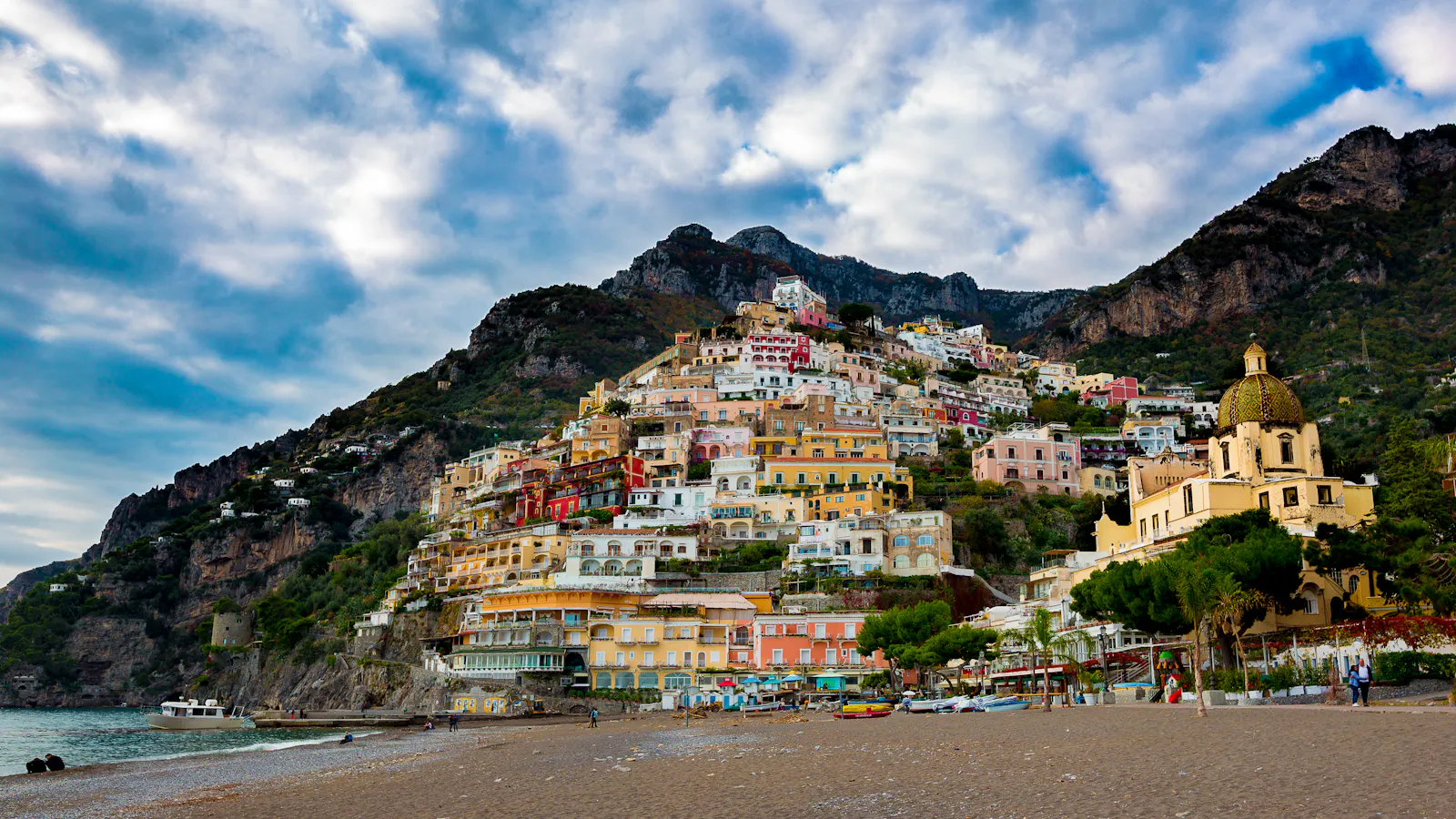 Positano on the Amalfi Coast — pastel houses cascading down the cliffside to the sea