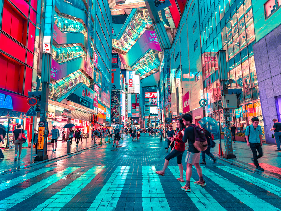 A neon-lit shopping street crossing in Tokyo at dusk